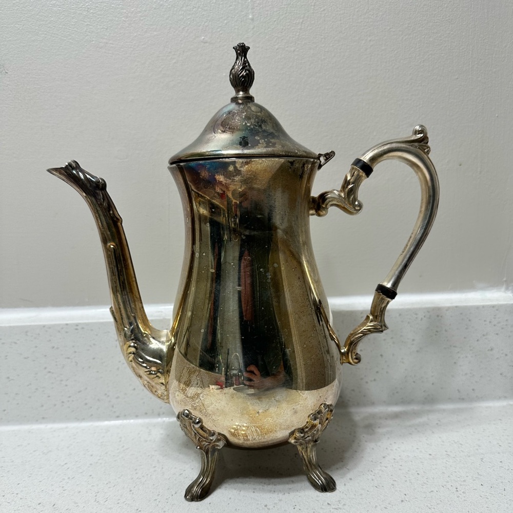 Silver tea kettle